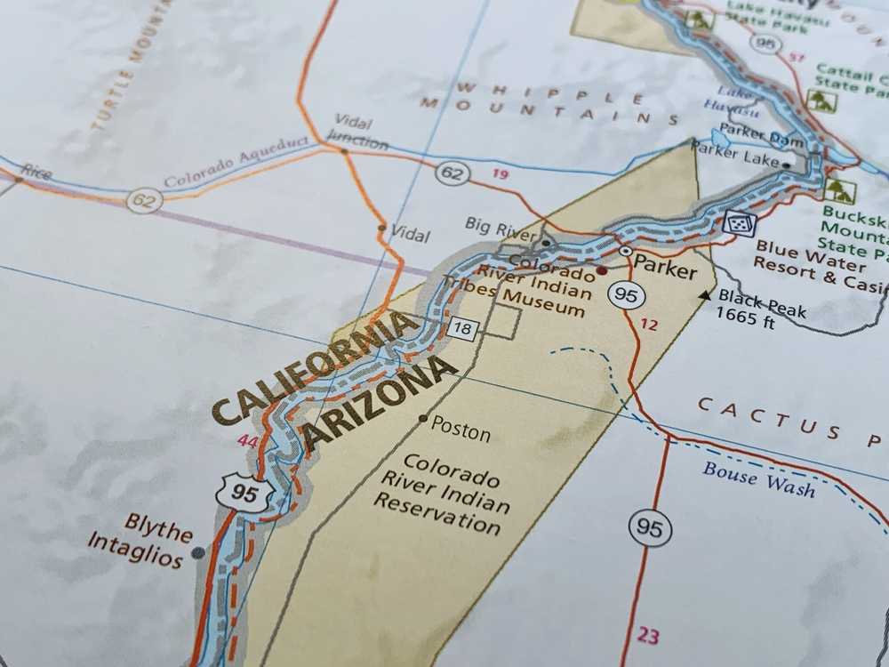 A close-up of a map showing the border between California and Arizona, with safe locations such as Parker, Blythe, and the Colorado River Indian Reservation labeled. Highways and rivers are also visible.